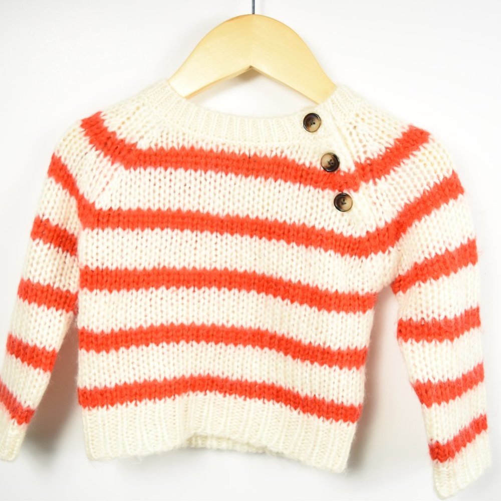 Cream and red loose knit sweater